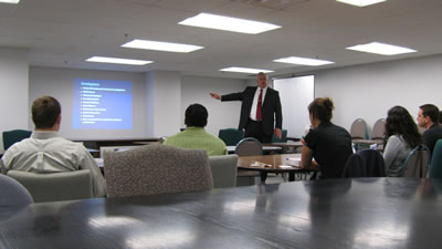 MFCU Edudation image of a Presenter leading a training