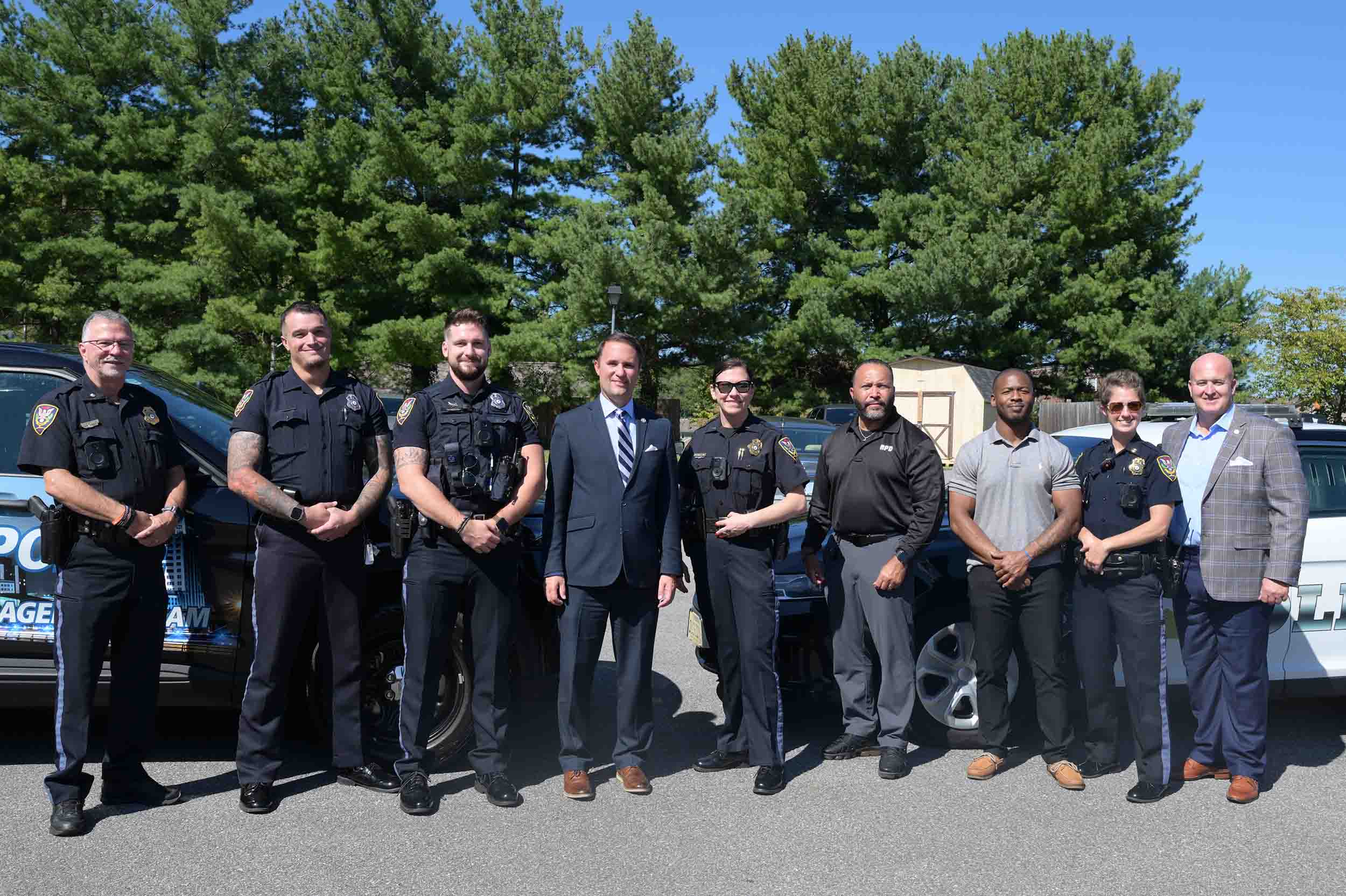 Attorney General Jason S. Miyares with Roanoke Police Officers